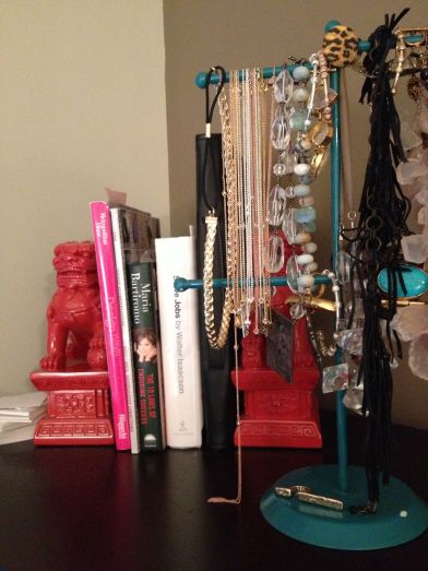 Gold braided headband hanging next to many of my Chelsea Charles necklaces.