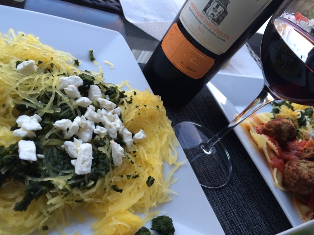 Here is a picture of our dinner tonight. Spaghetti squash with spinach, olive oil and feta on my plate. Both spaghetti squash and pasta on Geoff's plate. 